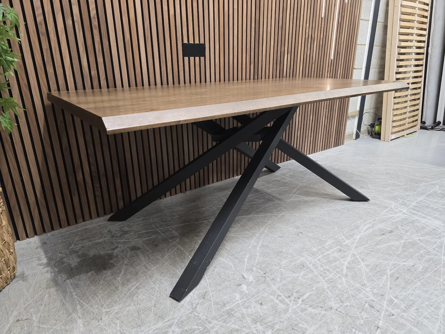 left side photo of the sapporo dining table in rustic oak