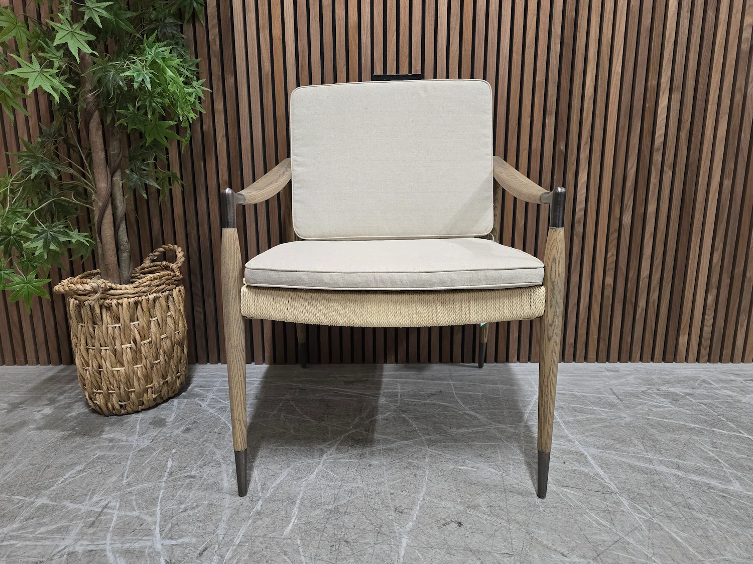 burford naural rattan armchair with exposed wooden arm