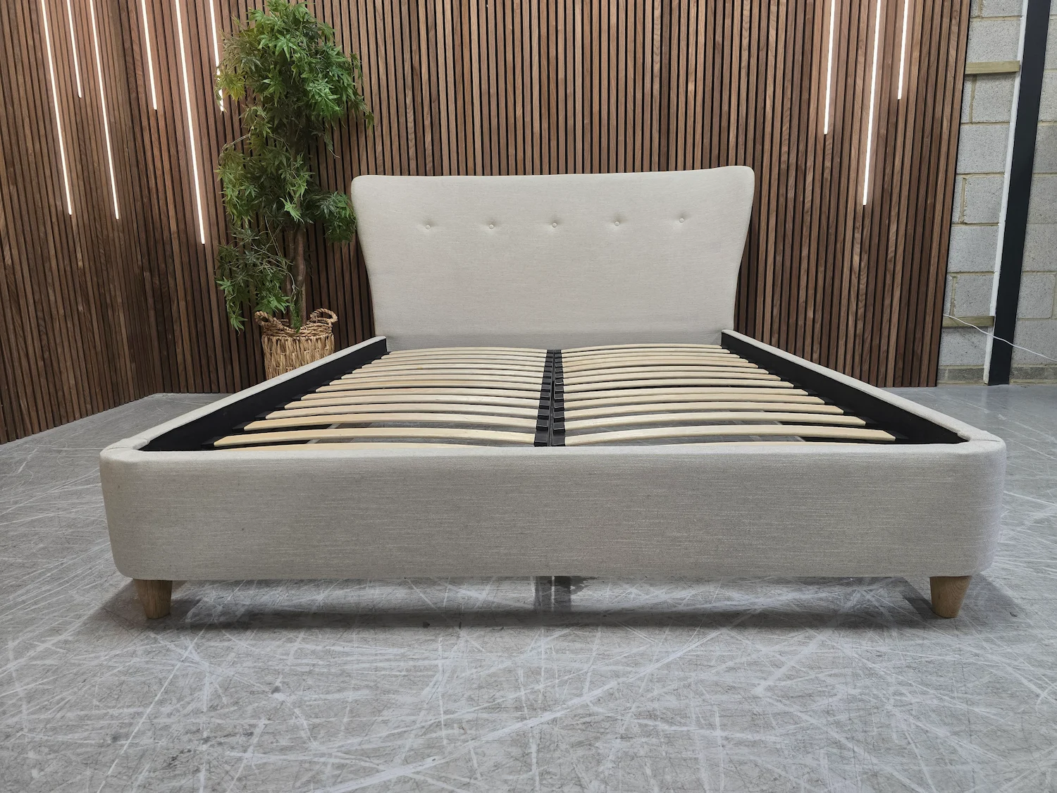 loaf smoke king size bed frame in thatch house fabric