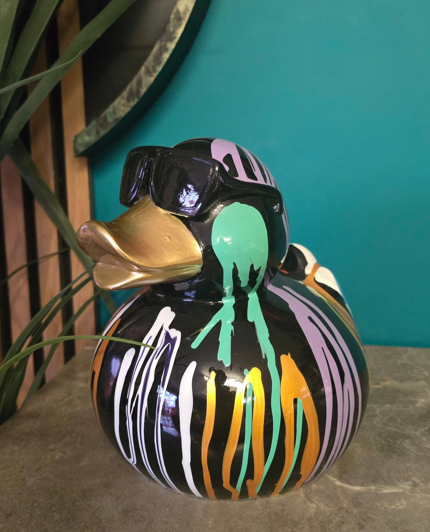 Multicoloured duck ornament with sunglasses