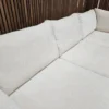 overhead of cushions Large Corner Sofa & Glass Coffee Table In White Cosy Fabric