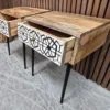 drawers open on the bedside tables