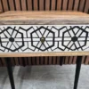 close up of the drawer fronts in white and a black abstract design