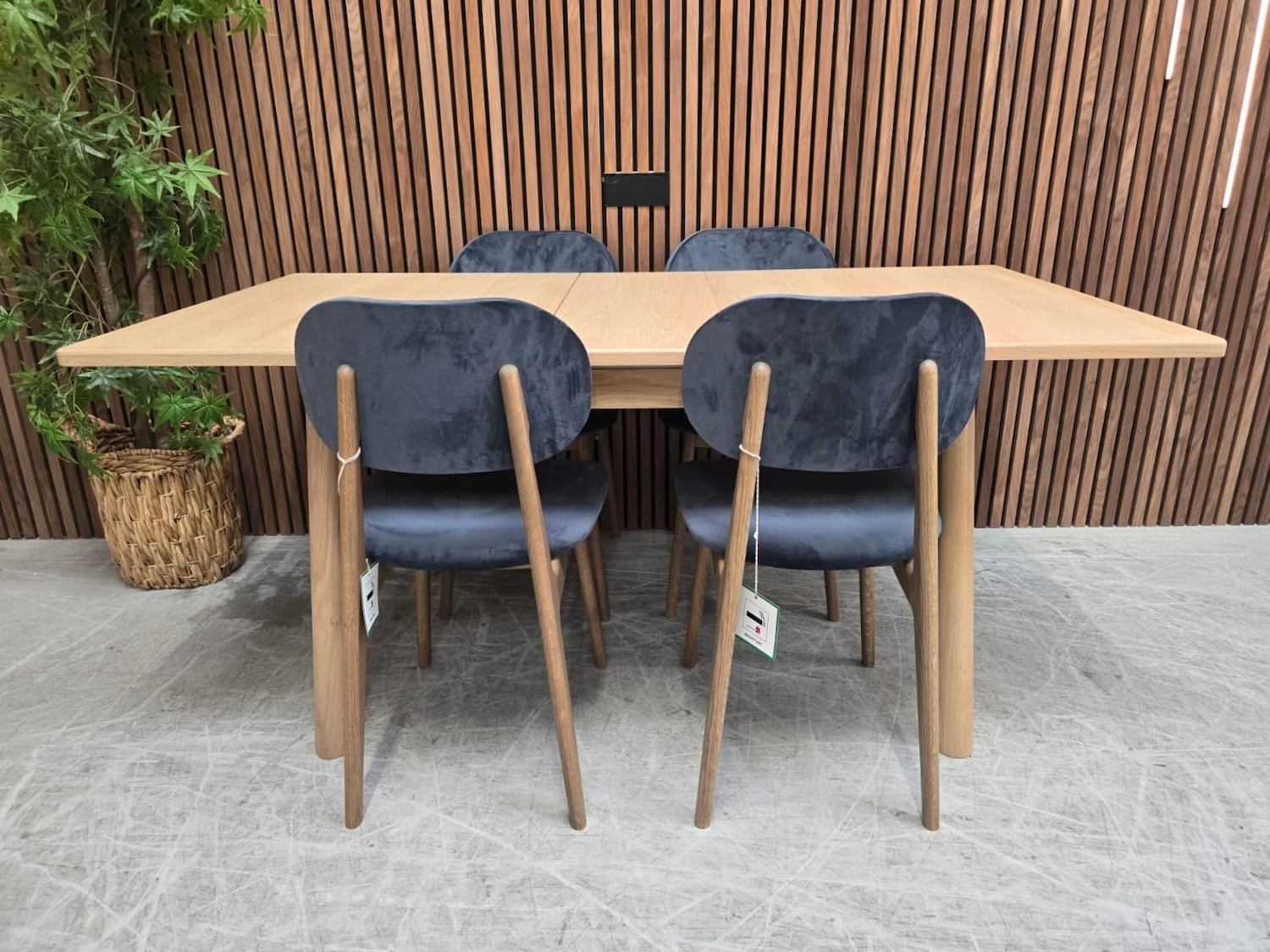 4x steel velvet and oak chairs around the anderson extending dining table