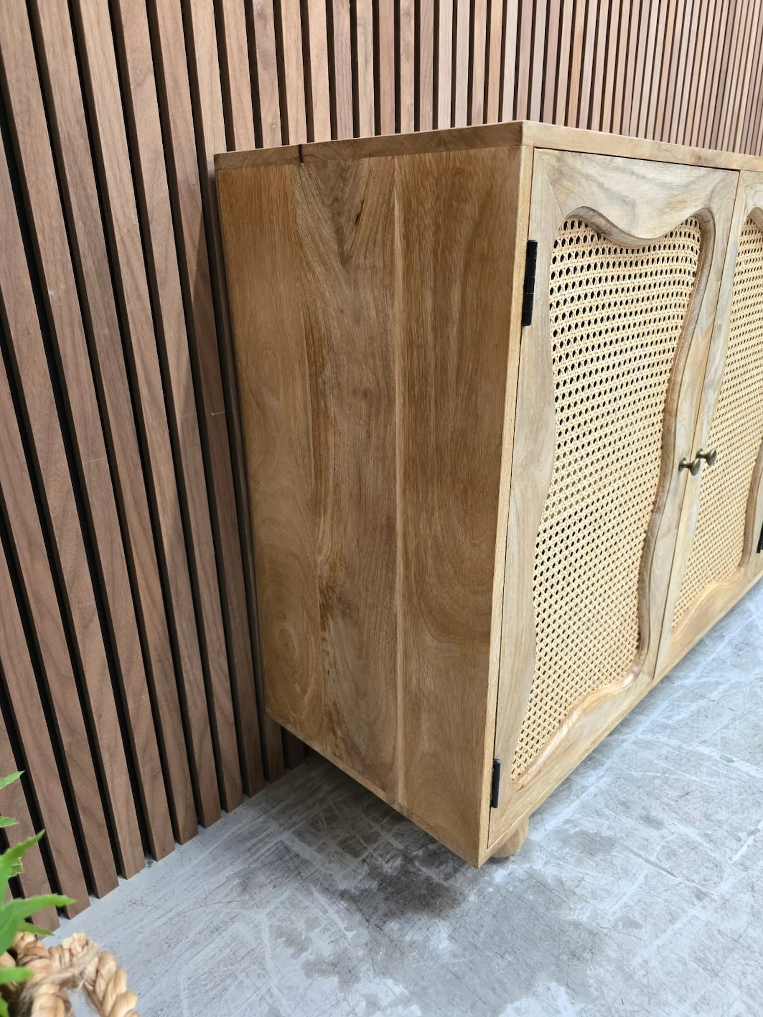 left side of the boho themed sideboard