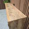 close up of the mango wooden grain on top of the sideboard