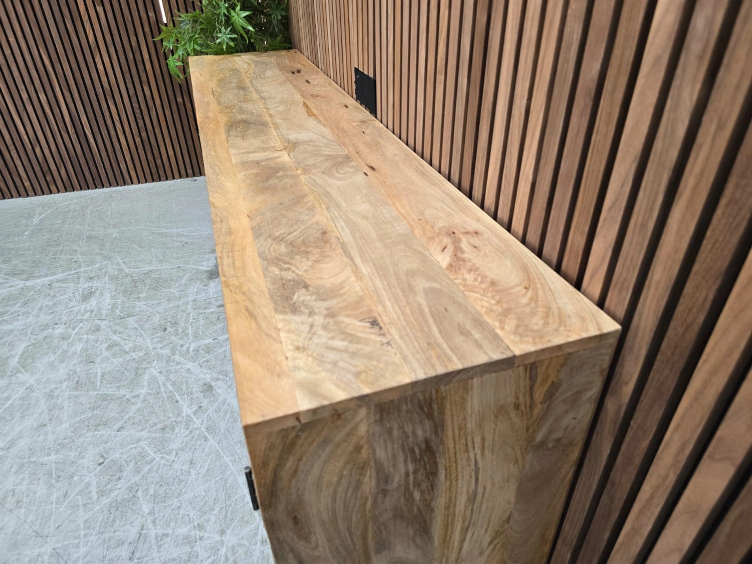 close up of the mango wooden grain on top of the sideboard