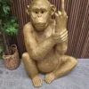 Huge monkey resin statue with his finger up and tongue out