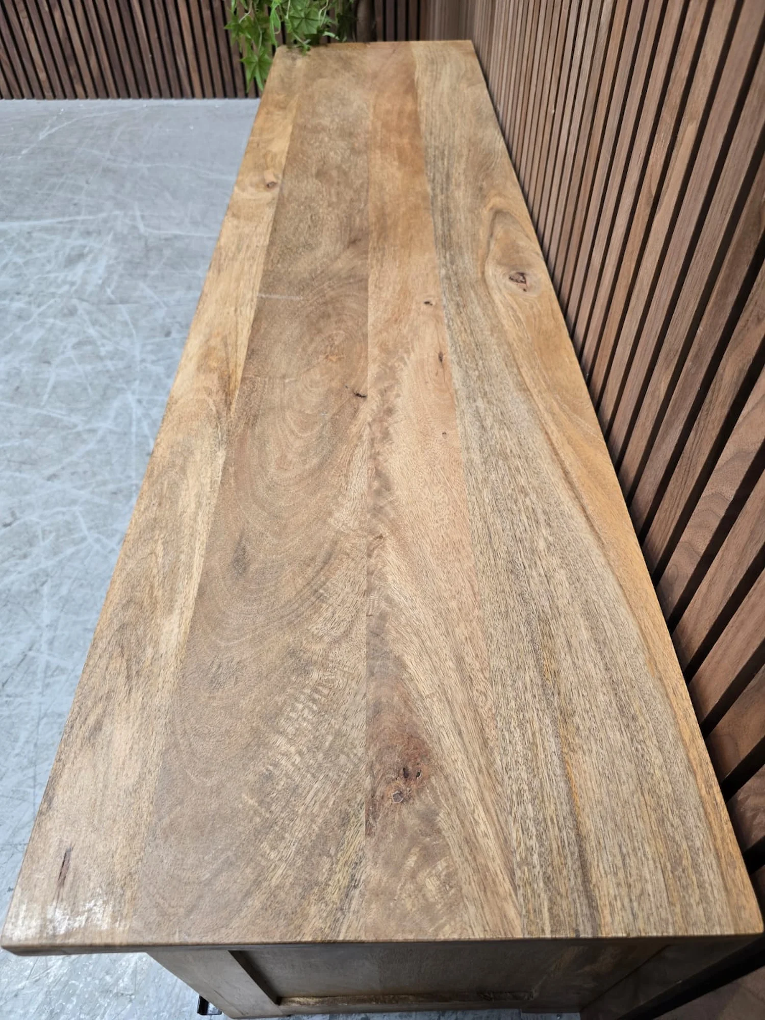Mango & Iron large tv stand 5 top of the tv stand showcasing the light mango wood grain