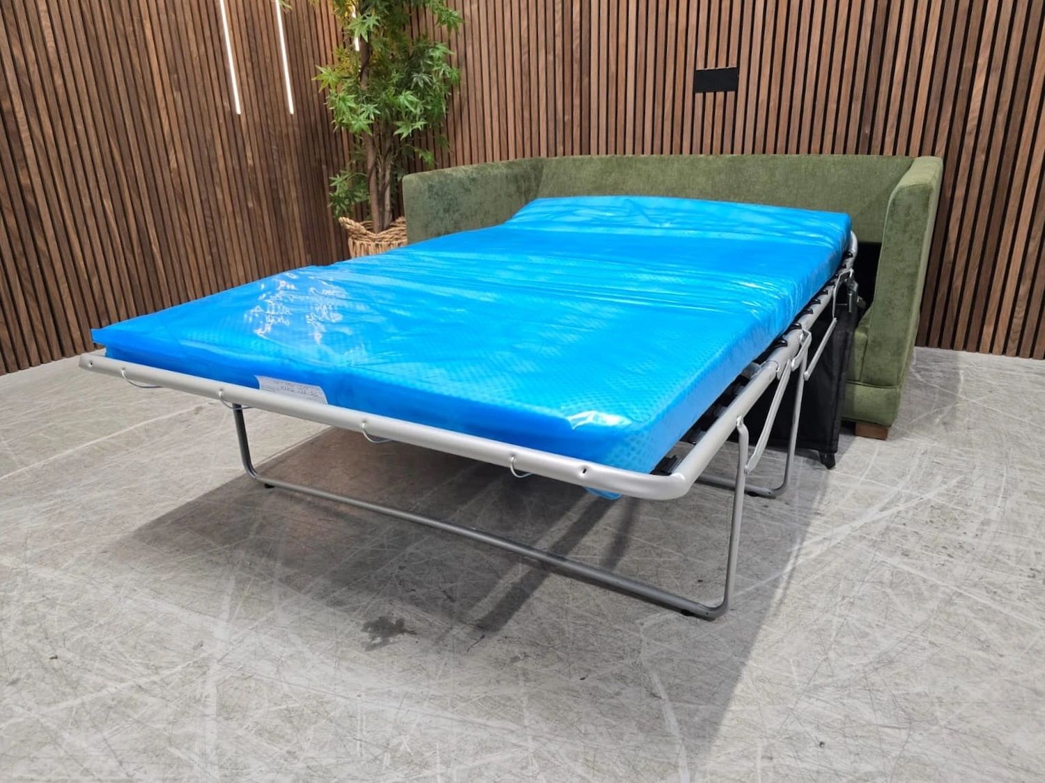 right side photo of aissa 2 seater sofa bed with bed out