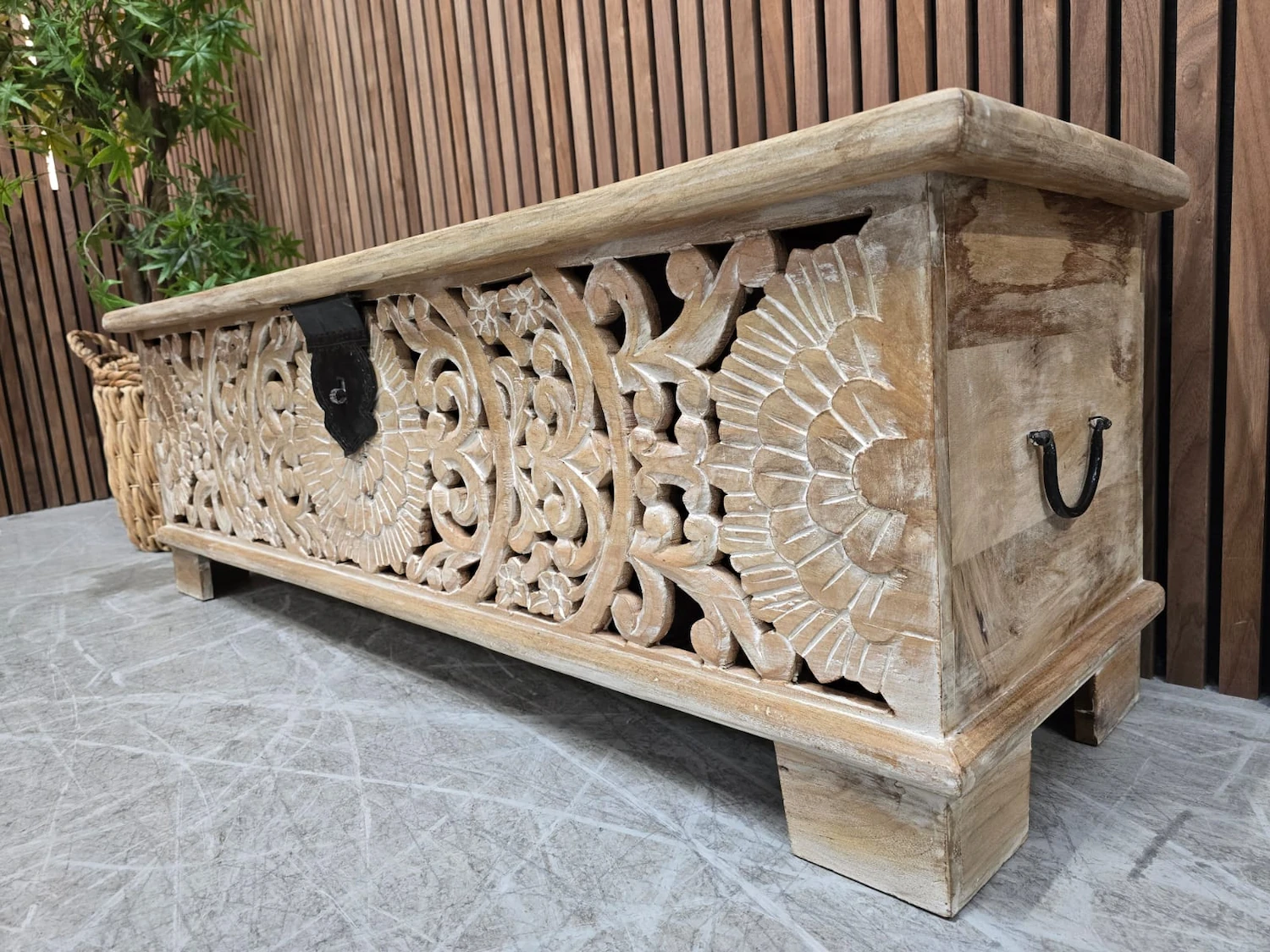 front right side photo showing the carving detail to the wood