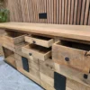 photo of the drawers open on the top of the sideboard