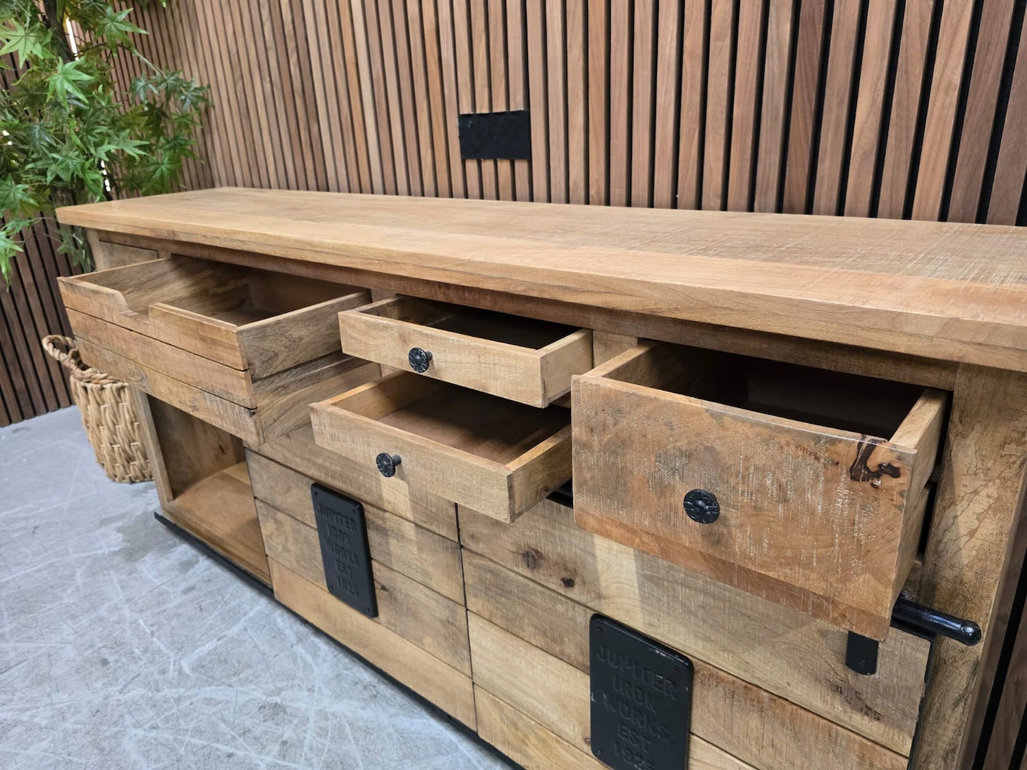 photo of the drawers open on the top of the sideboard