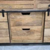 close up photo of the middle drawers on the sideboard