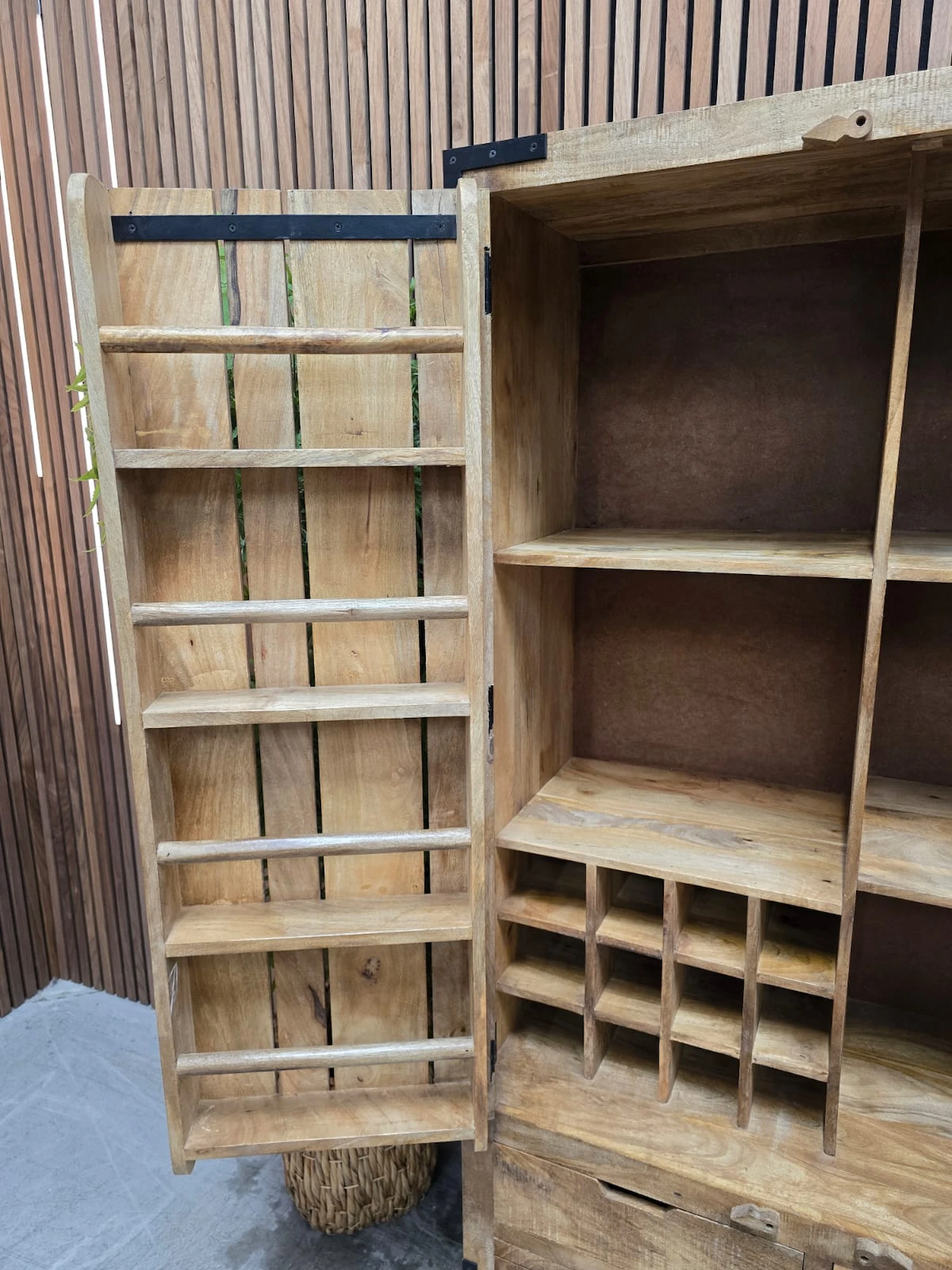 picture of the inside left door showcasing a spice rack