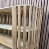 slatted bookcase 4 curved slatted mango wooden detail on the top of the bookshelf