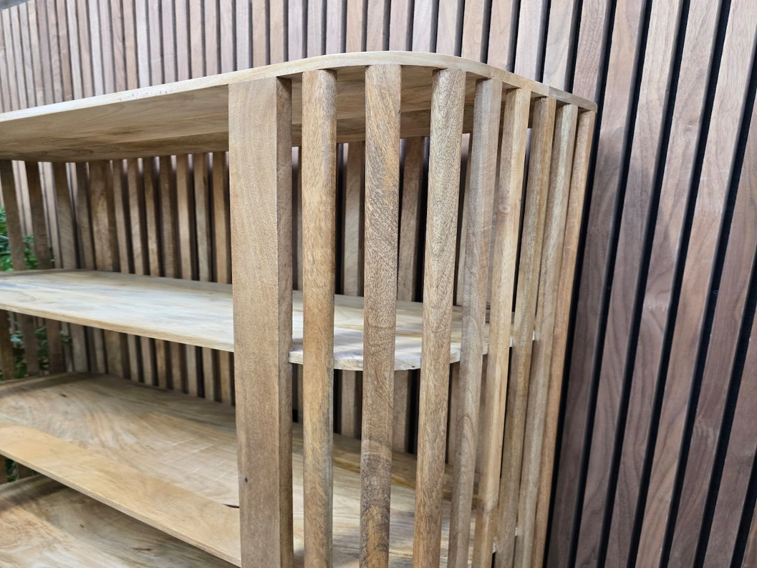 slatted bookcase 4 curved slatted mango wooden detail on the top of the bookshelf