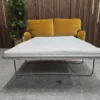 bluebell 2 seater sofa bed in amber smart velvet with the bed mechanism folded out