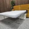 bluebell 2 seater sofa bed in amber smart velvet with the bed mechanism folded out from the right side