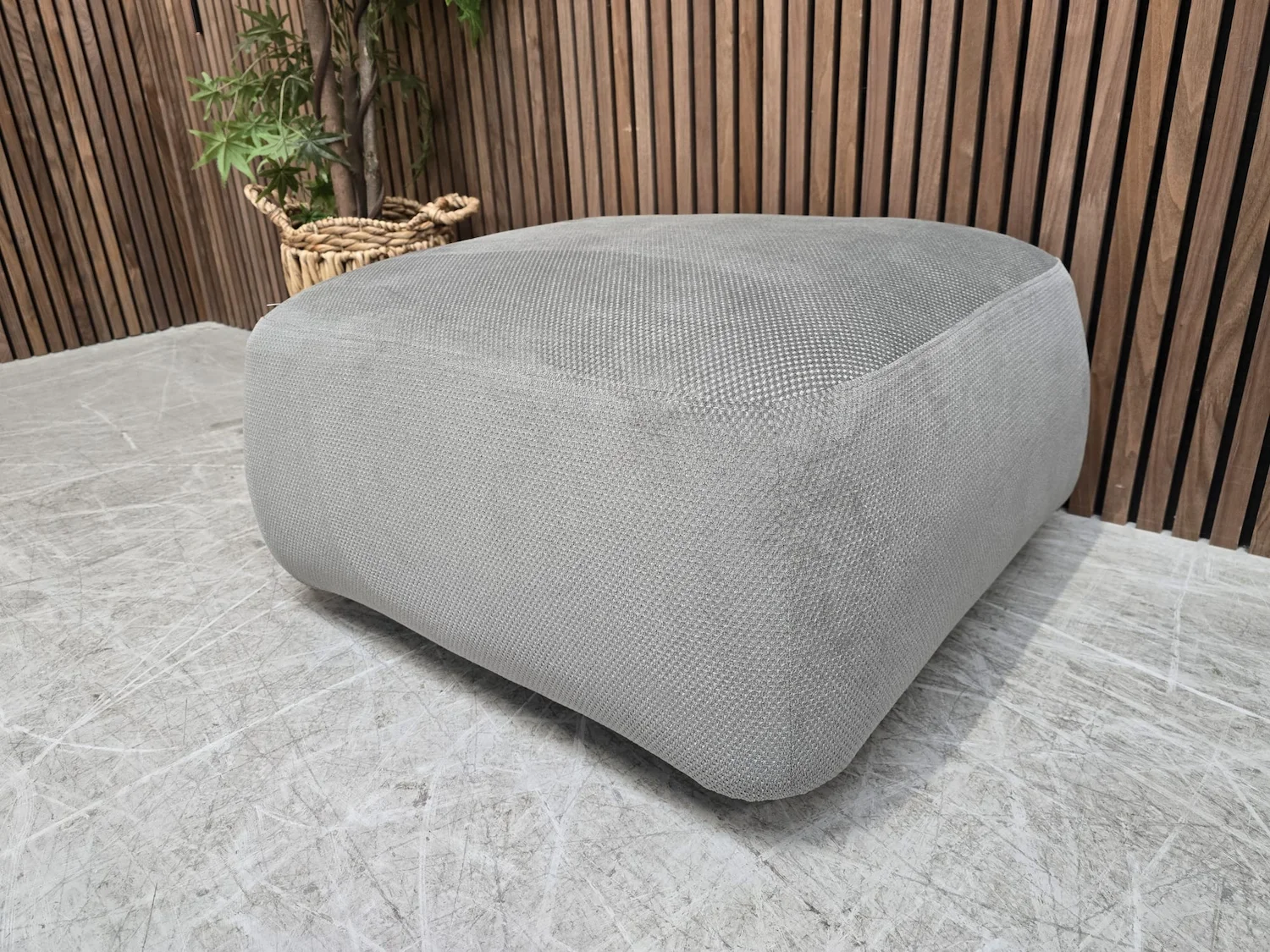 carmel square footstool in speckled chenille from the right side
