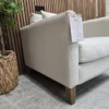 izzy armchair in pumice house basket weave 3 left side profile of the izzy armchair side